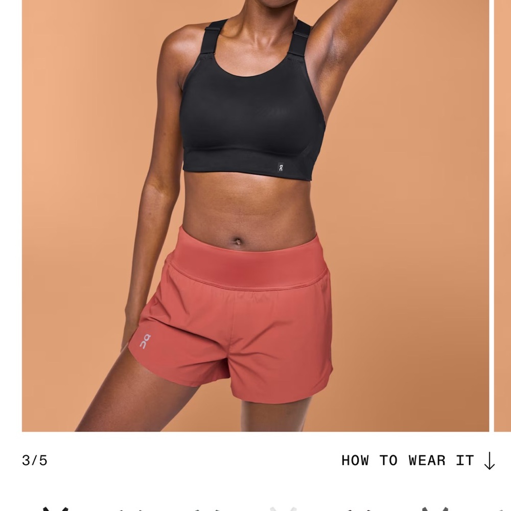 On Running Black Bra and Coral Shorts